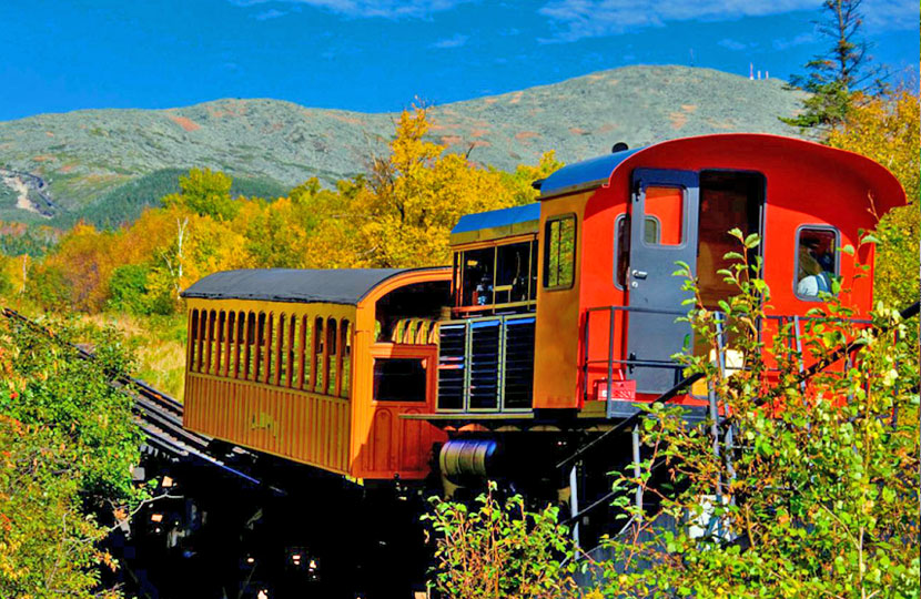 Experience New England's autumn colors on a fall foliage train.